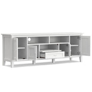 Handcrafted Warm Shaker TV media stand by Simpli-Home with open shelves and storage compartments for media devices and decor.