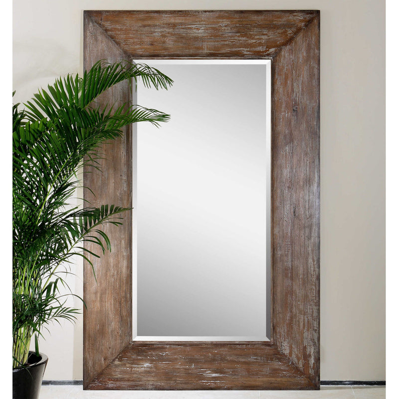 Large dark brown wood wall mirror with a sleek, rectangular frame by Uttermost, showcasing a modern and elegant design.