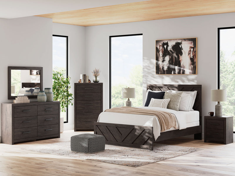 Charcoal-colored Prendonea dresser and mirror by Signature Design Ashley, featuring sleek wood finish and modern bedroom furniture style.