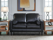 Signature Design by Ashley Bryceview loveseat in Onyx, a stationary sofa with plush cushions and modern fabric upholstery.
