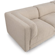 Classic Home Adalynne stationary sectional sofa with plush cushions and modern design, shown in a living room setting.