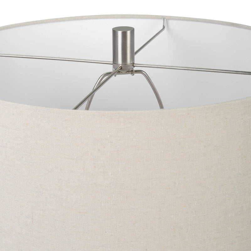 Uttermost Cyclone Ivory table lamp with textured ceramic base and fabric shade, ideal for modern or contemporary home decor.