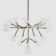 Black and gold Phoenix chandelier by Classic Home featuring elegant metal framework and multiple light fixtures.