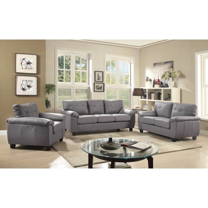 Comfortable stationary sofa from Glory Furniture with plush cushions and modern design, shown in a cozy living room setting.