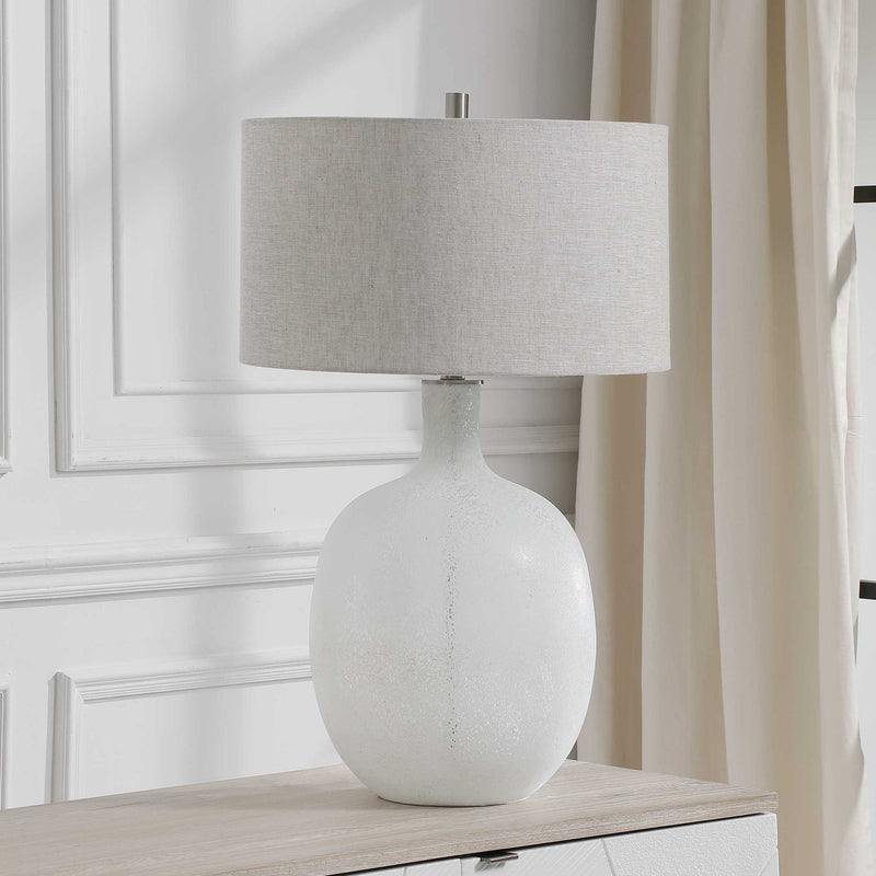 Uttermost white mottled glass table lamp with a sleek modern design, perfect for contemporary living spaces.