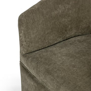 Classic Home Valencia swivel accent chair with plush fabric upholstery and rounded armrests, shown in a cozy living room setting.