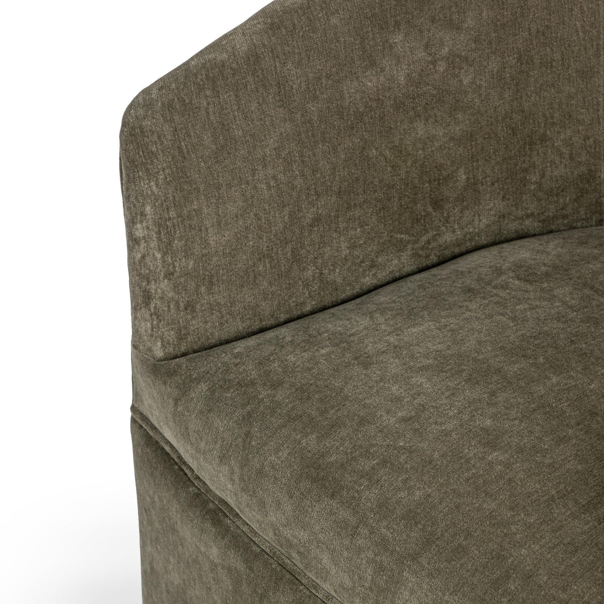 Classic Home Valencia swivel accent chair with plush fabric upholstery and rounded armrests, shown in a cozy living room setting.