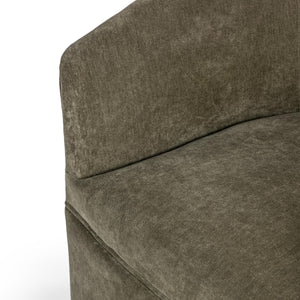 Classic Home Valencia swivel accent chair with plush fabric upholstery and rounded armrests, shown in a cozy living room setting.
