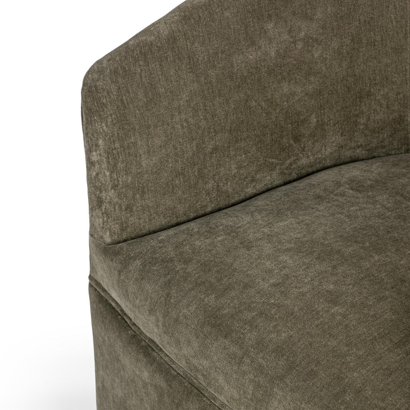 Classic Home Valencia swivel accent chair with plush fabric upholstery and rounded armrests, shown in a cozy living room setting.