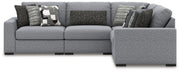 Benchcraft Bealton sectional sofa in a stationary design, featuring plush cushions and neutral upholstery for a modern living room.
