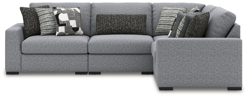 Benchcraft Bealton sectional sofa in a stationary design, featuring plush cushions and neutral upholstery for a modern living room.