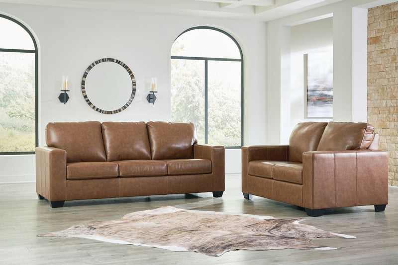 Signature Design by Ashley Bolsena living room set with stationary sofas and loveseats in a modern, comfortable living space.