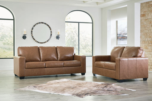 Signature Design by Ashley Bolsena living room set with stationary sofas and loveseats in a modern, comfortable living space.