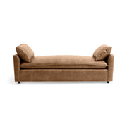 Backless daybed sofa by Classic Home, Caplan model, featuring plush upholstery and sleek design in a modern living room setting.