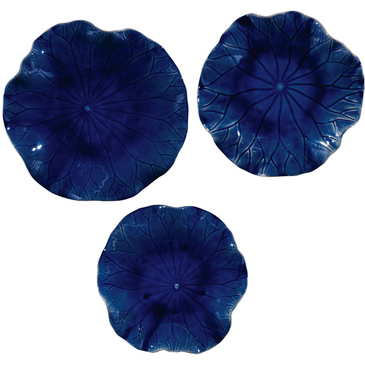 Set of three ceramic wall decor pieces by Uttermost, featuring modern abstract designs for stylish wall accents.