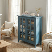 Handcrafted Acadian medium storage cabinet by Simpli-Home, featuring a wooden accent cabinet with doors and storage compartments.