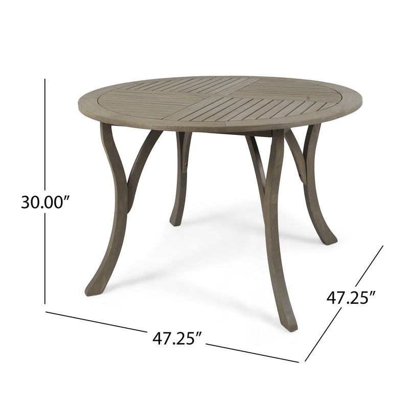 Hermosa outdoor acacia wood circular dining table by Noble House, showing a sturdy, natural wood surface suitable for outdoor dining.