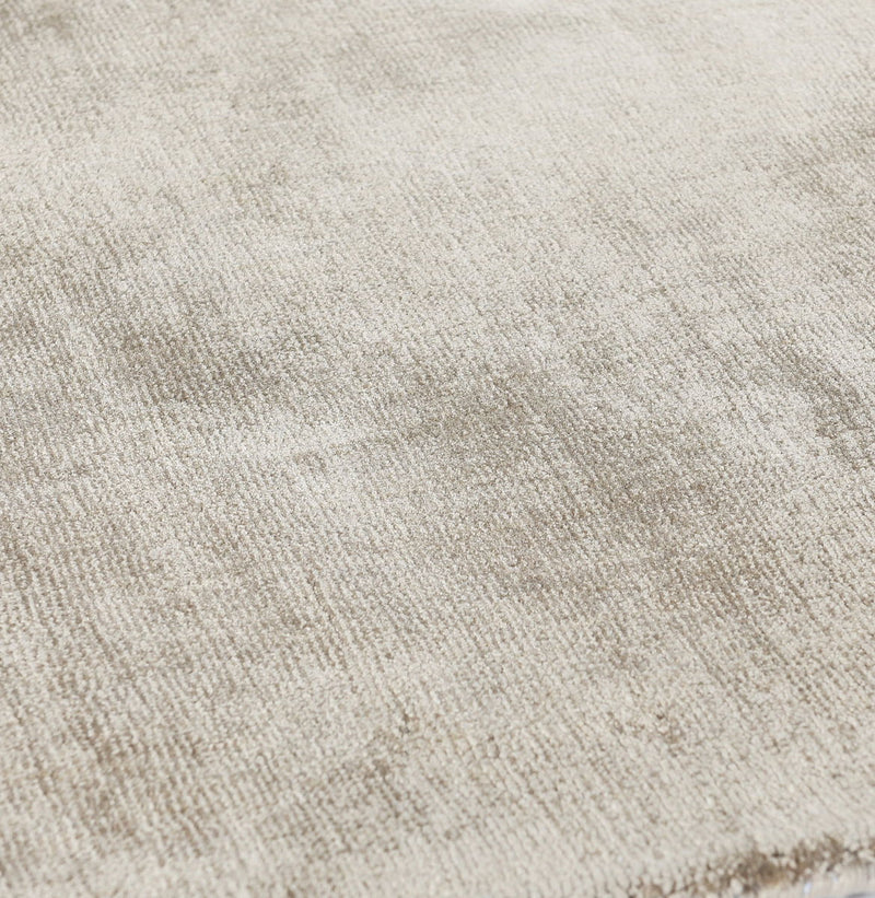 Classic Home Berlin area rug featuring a geometric pattern in neutral tones, ideal for modern living room or bedroom decor.