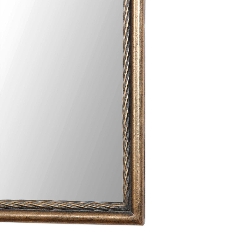 Antiqued gold wall mirror by Uttermost, Adelasia style with an elegant, vintage-inspired frame reflecting classic decor.