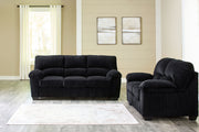 Signature Design by Ashley SimpleJoy living room set with stationary sofas and loveseats in a modern fabric, arranged in a cozy space.