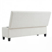 Noble House upholstered storage ottoman bench with cushioned top and wooden legs, ideal for living room or bedroom storage.