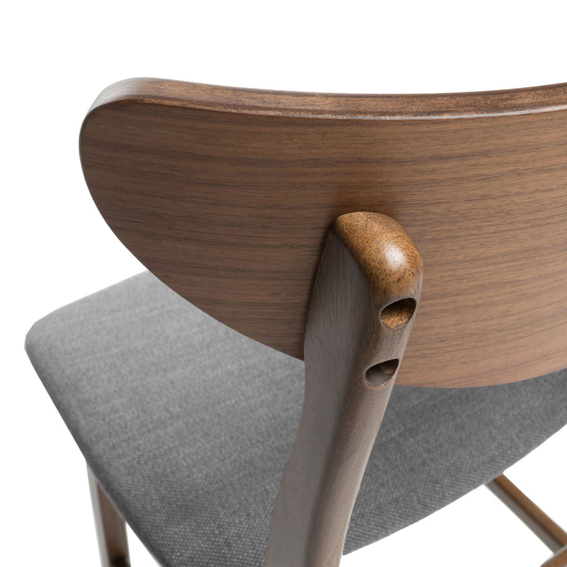 Noble House elegant counter height chair with a cushioned seat, featuring a sleek design and sturdy wooden legs.