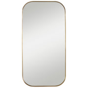 Uttermost Taft wall mirror with a sleek, modern frame, reflecting a contemporary home decor setting.