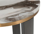 Round brown end table with brass finish legs from Signature Design by Ashley, featuring sleek, modern design and sturdy construction.