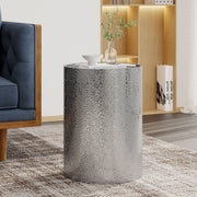 Noble House modern round accent table with hammered surface and sleek design, ideal for stylish home decor.