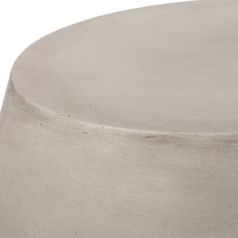 Outdoor oval-shaped side table by Noble House with a sleek surface and sturdy metal frame for patio or garden use.