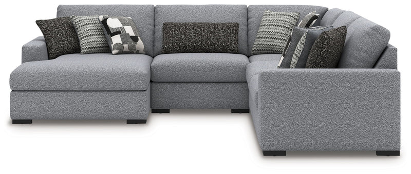 Benchcraft Bealton stationary sectional sofa with plush cushions and fabric upholstery, shown in a modern living room setting.