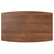 Rectangular dining table from Simpli-Home Draper collection, featuring a wooden tabletop and sturdy legs for dining room use.