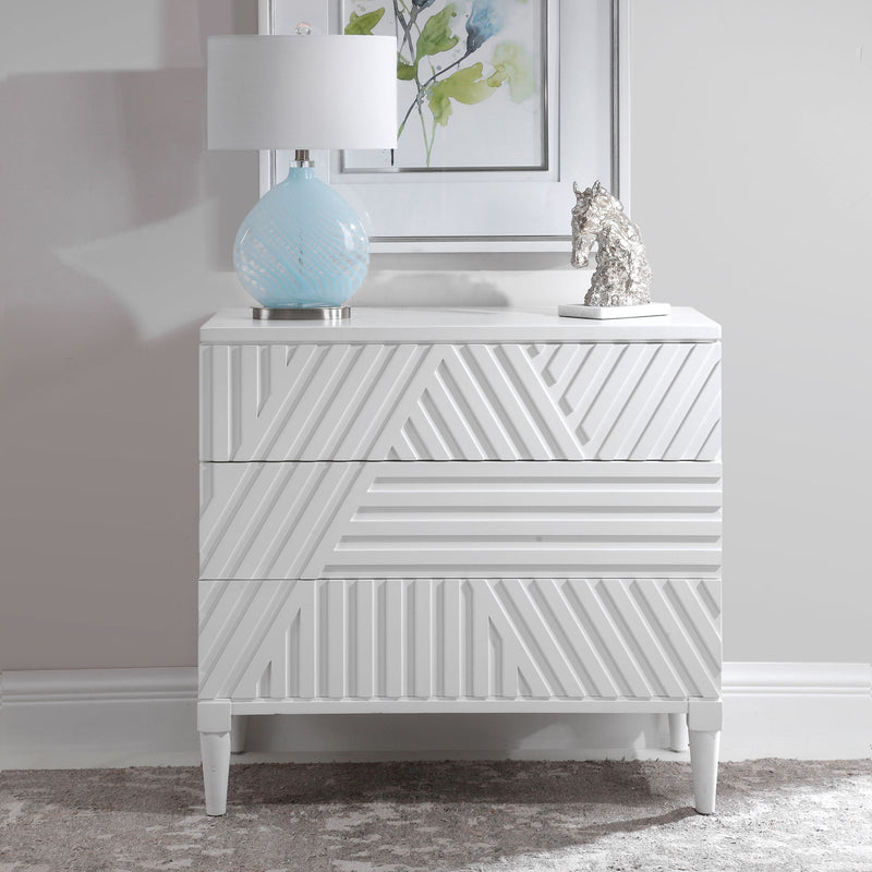 Uttermost Colby accent drawer chest with wood finish, featuring multiple drawers and sleek metal handles for stylish storage.