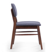 Set of two upholstered Noble House comfort dining chairs with padded seats and high backs in a modern design.