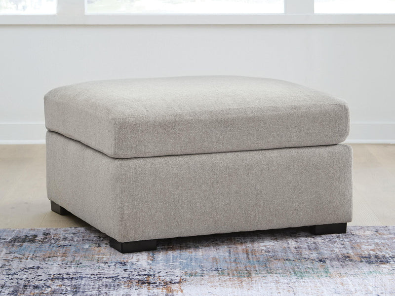 Benchcraft® ModMax Luxe oversized accent ottoman in Flint fabric, showing plush, contemporary design and soft textured upholstery.