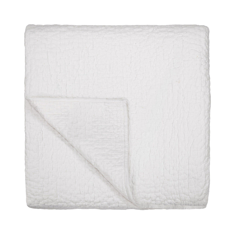 Danica quilt from Classic Home featuring a soft, patterned fabric with matching shams for a cozy bedroom decor.