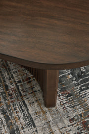 Korestone - Oval Cocktail Table - Dark Brown - R&R Furniture Gallery (Fountain Valley, CA)