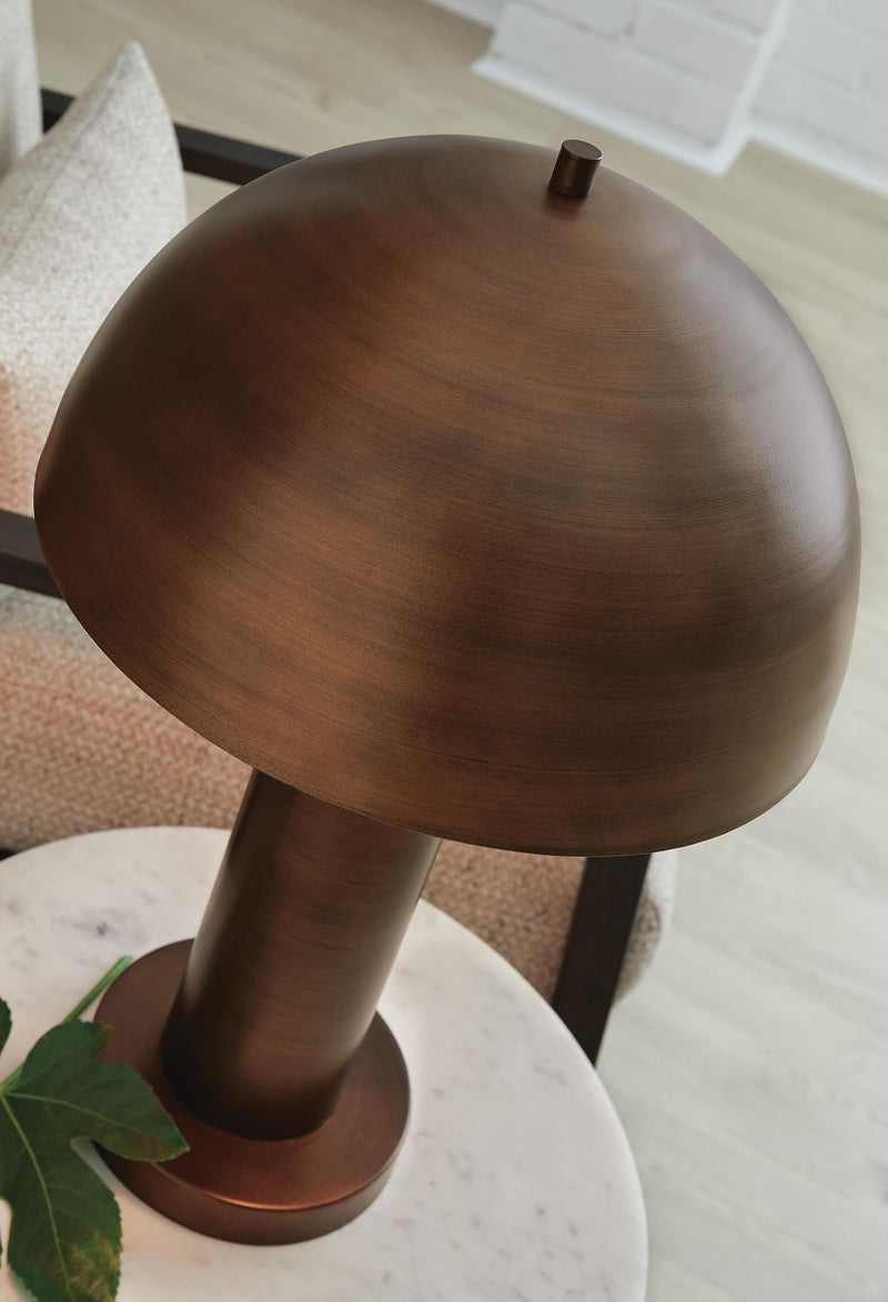 Signature Design by Ashley Wendfield metal floor lamp with a sleek, modern design and a tall, sturdy base.