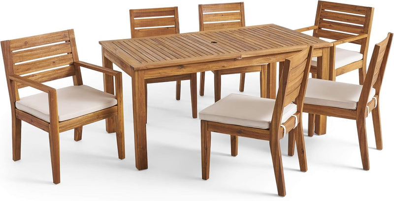 Noble House outdoor 6-seater expandable dining set with beige cushions, natural sandblasted finish, includes table and chairs.