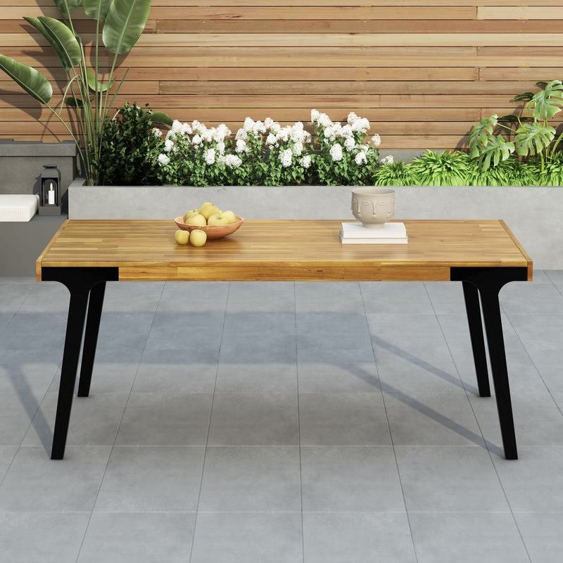 Noble House acacia wood patio dining table, 69-inch rectangular outdoor table with teak and black finish, ideal for outdoor dining areas.