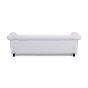 Noble House Chesterfield style 3-seater sofa with deep button tufting and classic stationary design in rich upholstery.
