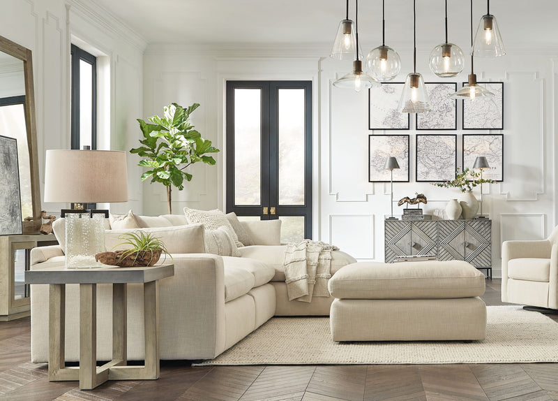 Benchcraft Elyza 4-piece sectional set with plush fabric cushions and modern design, perfect for stylish living room seating.