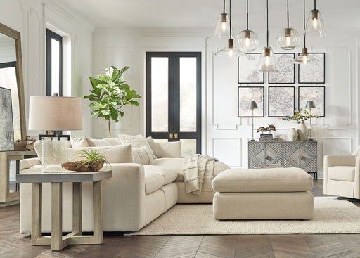 Benchcraft Elyza 4-piece sectional set with plush fabric cushions and modern design, perfect for stylish living room seating.