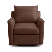 Classic Home Olivia swivel chair with a plush cushioned seat and curved backrest, shown in a stylish modern living room setting.