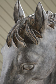 Antique black Carnlow sculpture by Signature Design by Ashley®, featuring a detailed artistic figurine for home decor.