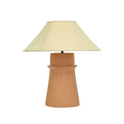 TOV Furniture Matson terracotta table lamp with natural finish, showcasing a stylish ceramic base and fabric shade on a wooden table.