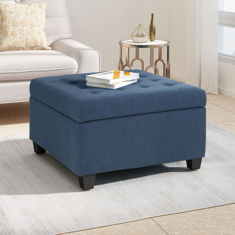 Noble House Isabella storage ottoman with contemporary design, upholstered in neutral fabric, featuring a removable lid for hidden storage.