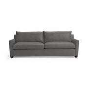 Classic Home Olivia stationary sofa with plush fabric and elegant design, shown in a modern living room setting.