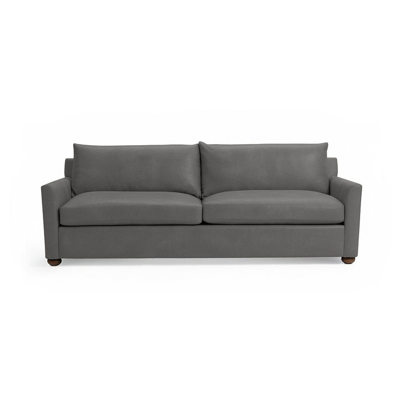 Classic Home Olivia stationary sofa with plush fabric and elegant design, shown in a modern living room setting.