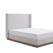 House & Home Furniture Hale upholstered wingback bed with padded headboard and fabric upholstery in a sophisticated bedroom setting